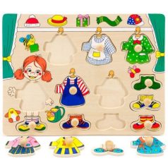 Fogantyús lapöltöztető lányos